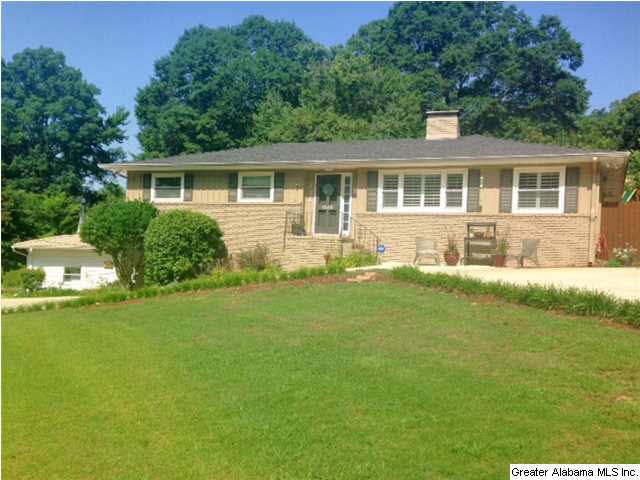 Great curb appeal with manicured yard