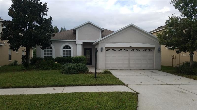 9745 Simeon Dr, Land O Lakes, FL 34638 - photo 1