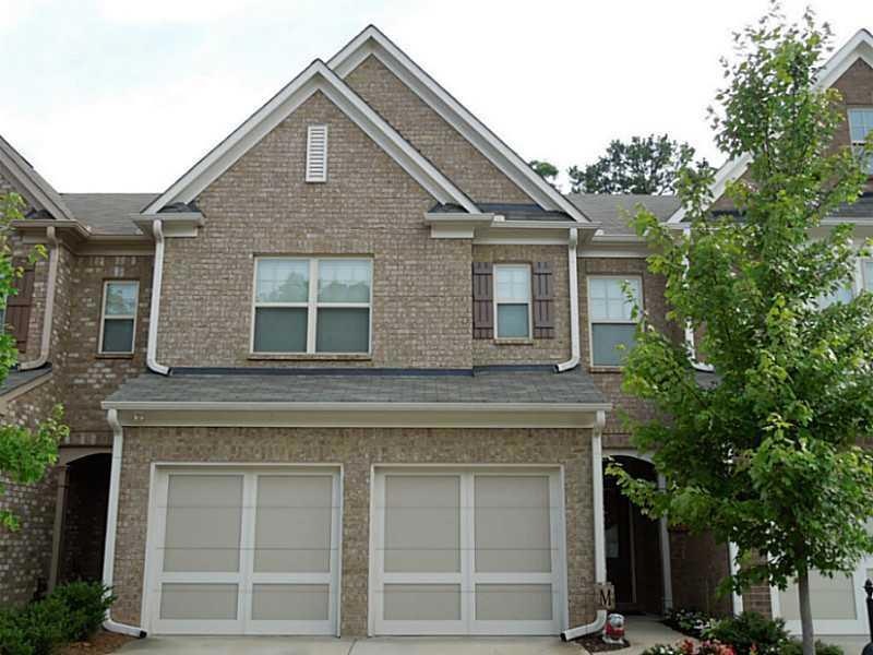 Exterior Front. Why drive under?  This townhome ha