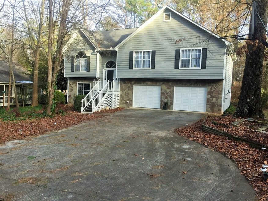 Beautiful home with long level driveway & turnaround area!