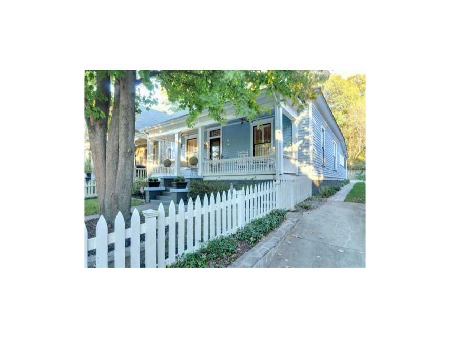 Exterior Front. Charming white picket fence welcom