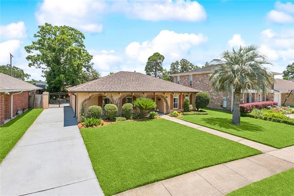 Exquisite Home with unique long driveway into rear