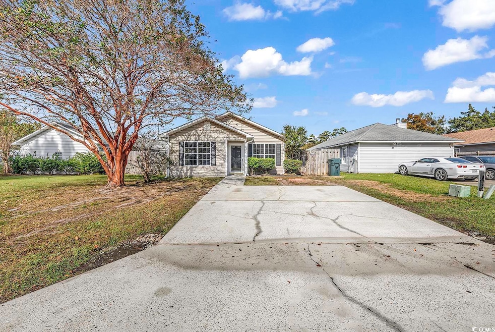 Single story home featuring a front yard