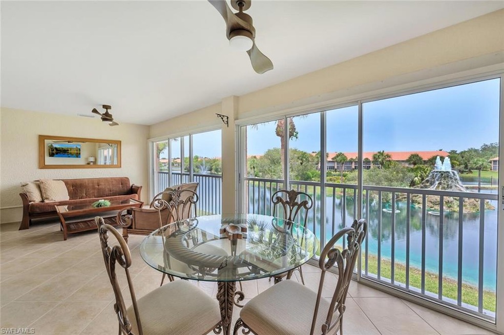 Sunroom with a water view