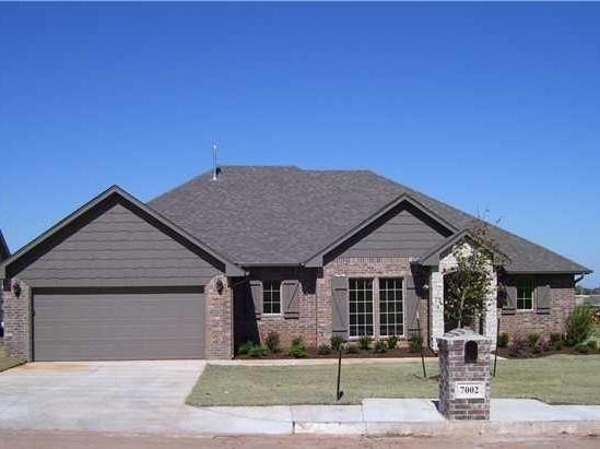 7002 Cherokee Crossing W, Warr Acres, OK 73132 - photo 1