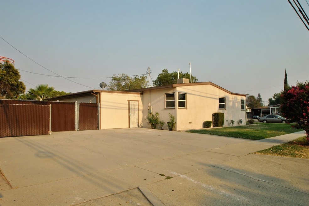 This home is located on a corner lot, has new roof