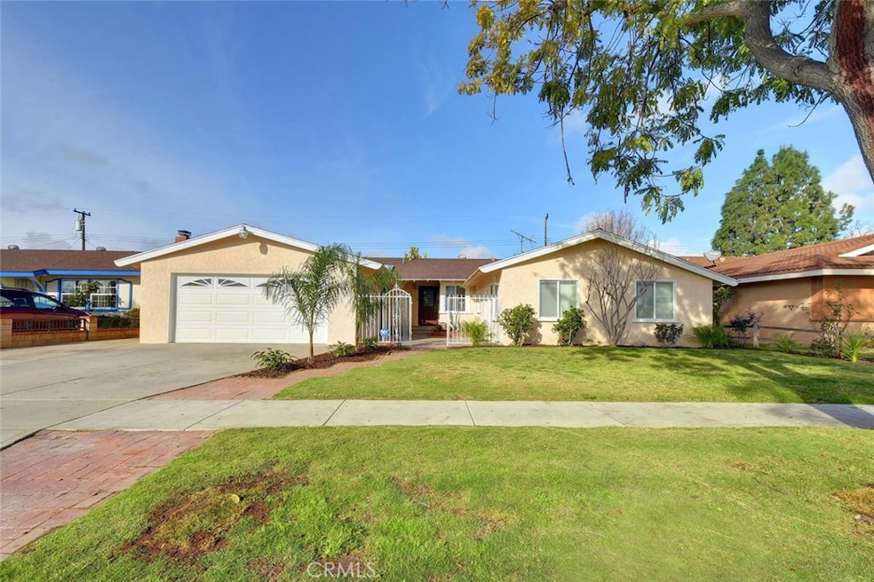 415 N Colorado St, Anaheim - Great Curb Appeal with New Exterior Paint, a Fenced Courtyard Entrance & a Front Porch