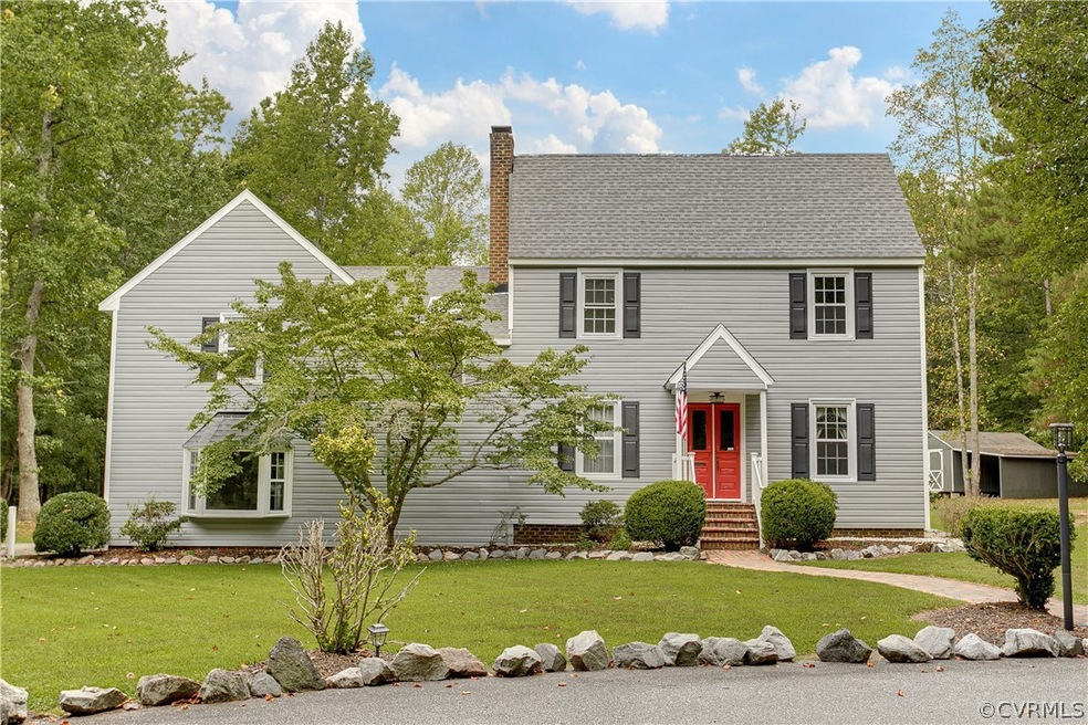 Front of home with circular driveway