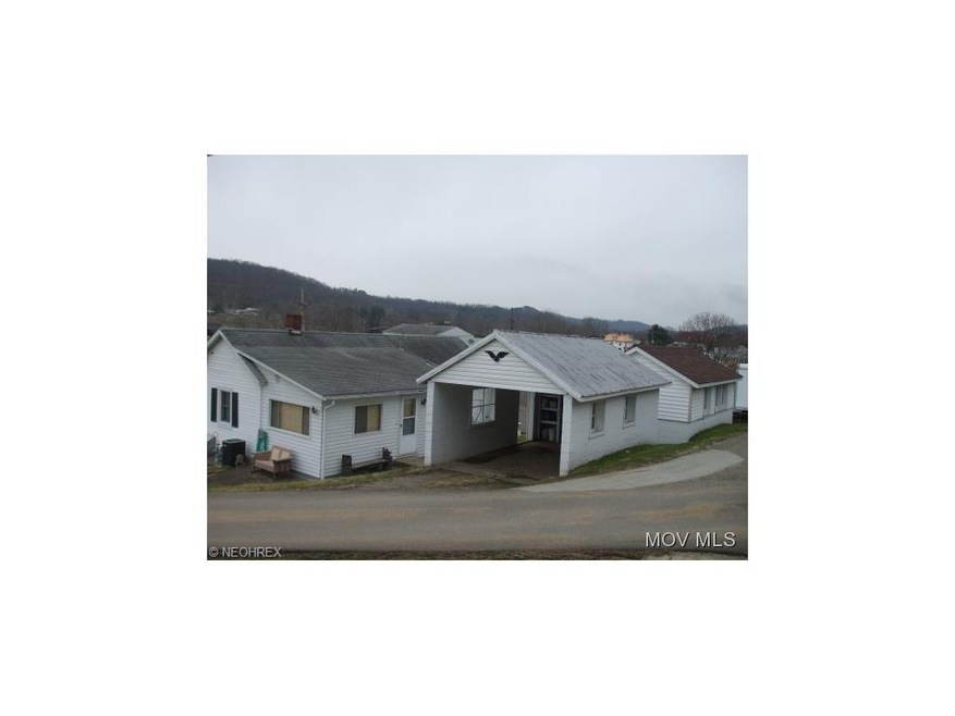 Side of home and garage