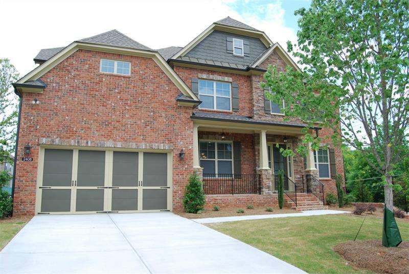 Beautiful 3 Sided Brick Home in small enclave of 1