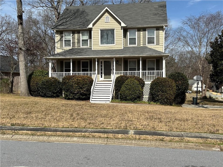 Front Entry with porch and front lawn