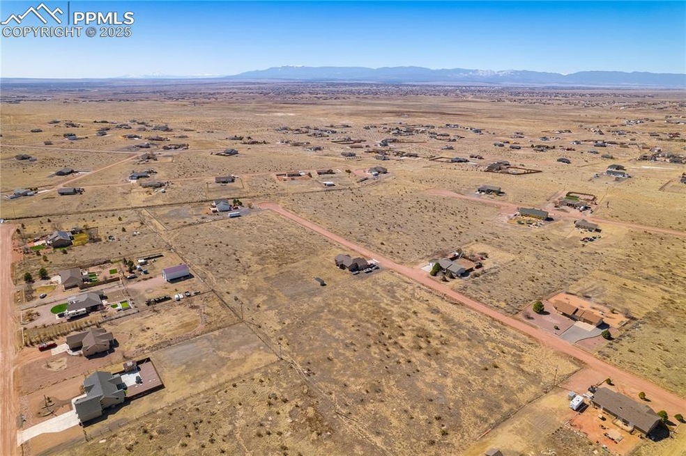 Aerial view with a mountain view, a rural view, an