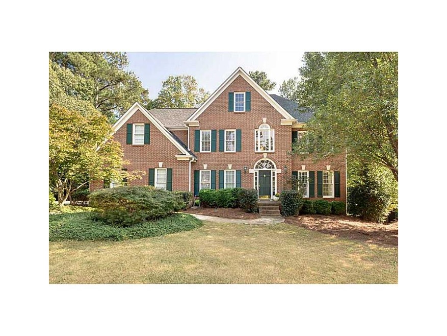 Exterior Front. BERMUDA SOD, SPRINKLER SYSTEM AND 