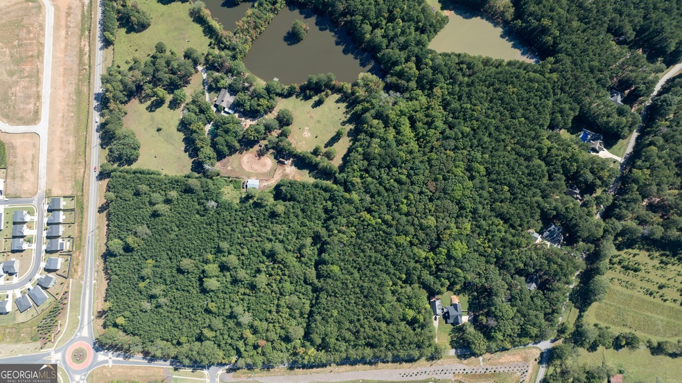 0 Poplar Rd unit 1.55+/- AC 10404697, Newnan, GA 30263 - photo 1