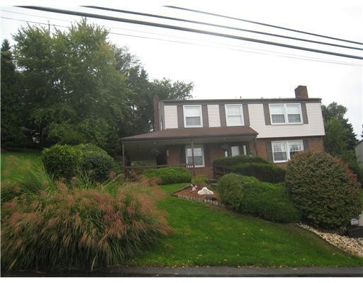 Exterior Front. Lovely landscaped yard