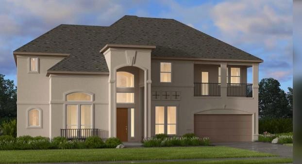 View of front of house with a balcony, stucco sid