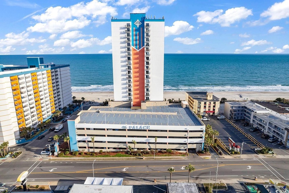 Aerial view featuring a water view and a view of t