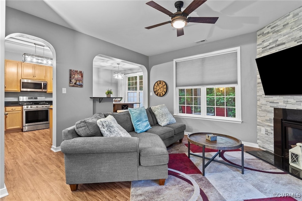Living room featuring light wood finished floors,
