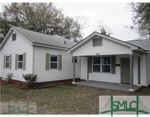 Exterior Front. All New Vinyl Siding, Shutters and