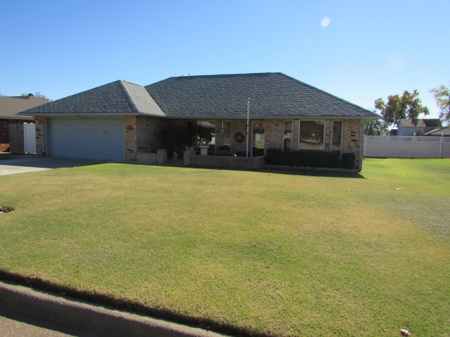 The house sits on a spacious lot and has wonderful