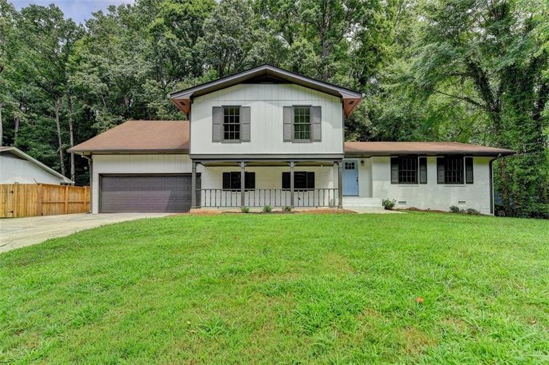 4125 White Oak Ln SW, Lilburn, GA 30047 - photo 1