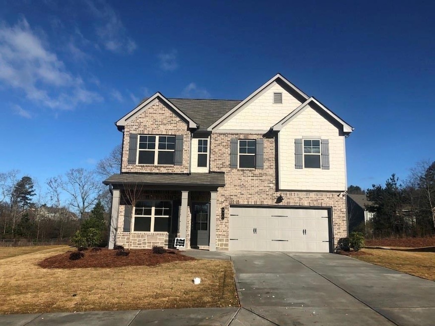 Craftsman-style house featuring an attached garage