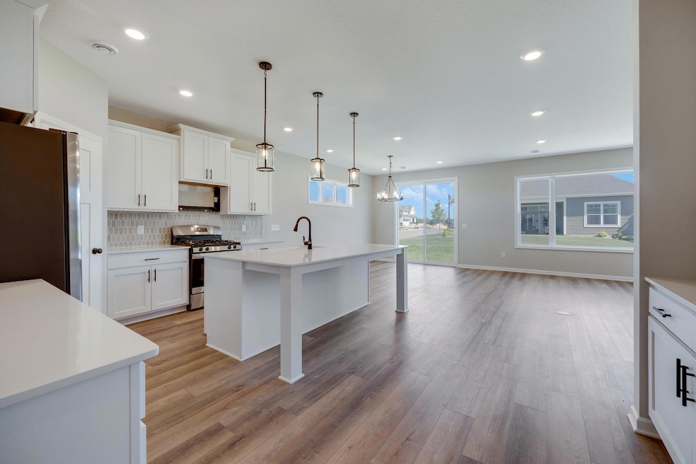 Kitchen - Note the huge island! Similar Home- finishes vary