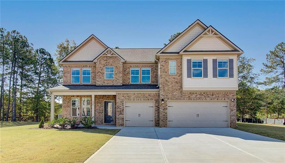 Craftsman-style house featuring a front yard and a
