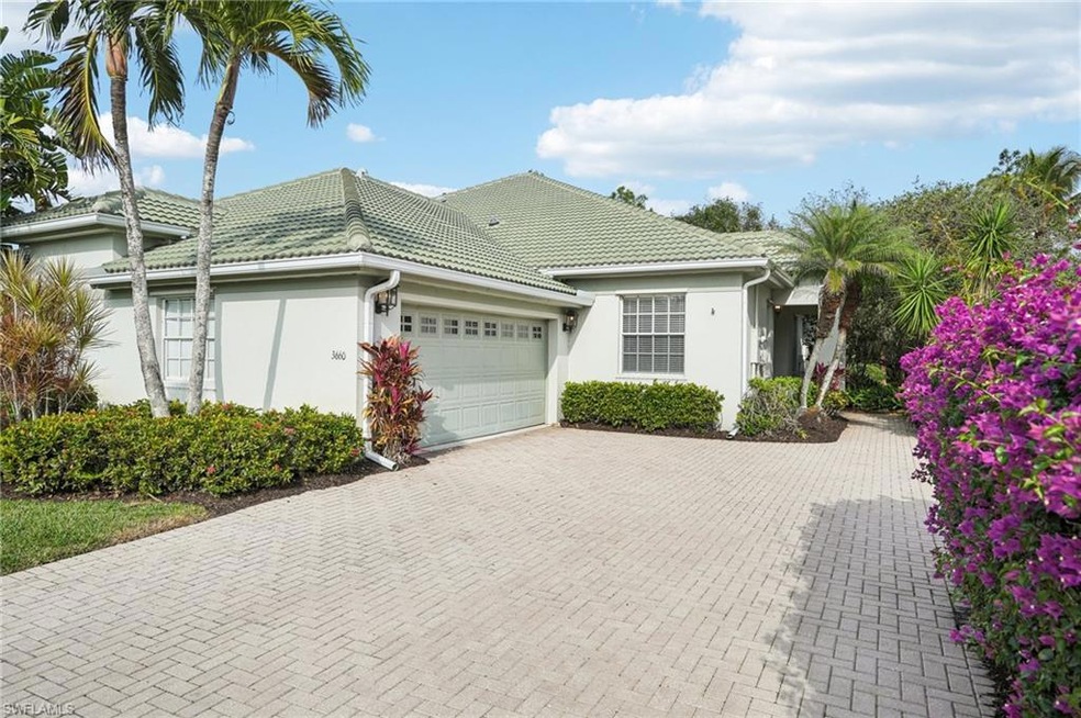 View of swimming pool with an in ground hot tub, a lanai, and a patio