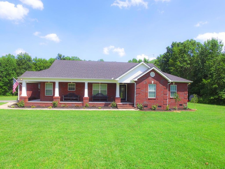 3.71 Acres with 3 Bedrooms and 2 Baths only minutes to the lake!