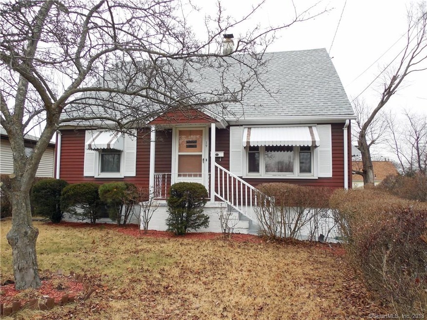 Exterior Front.  Vinyl siding, new roof, and repla