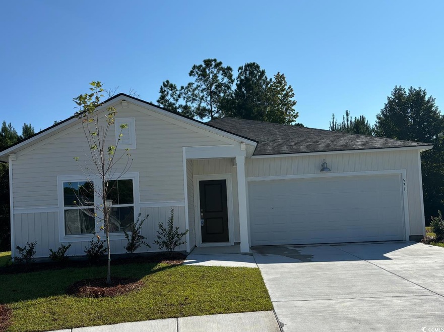 View of front of property with a garage and a fron