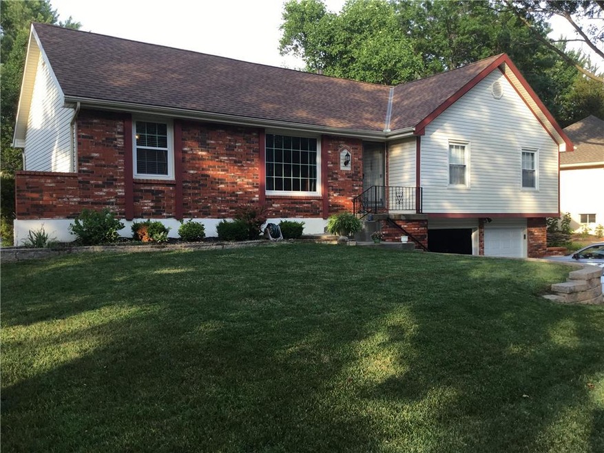Raised ranch with vinyl siding