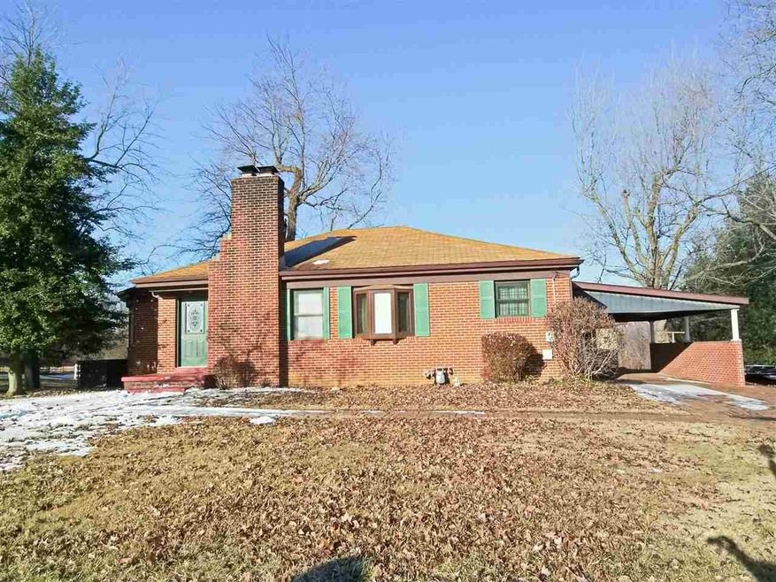 This Darmstadt home is situated on 2+/- acres and 