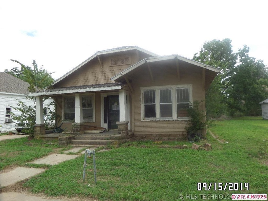 1207 W Division St, Henryetta, OK 74437 - photo 1