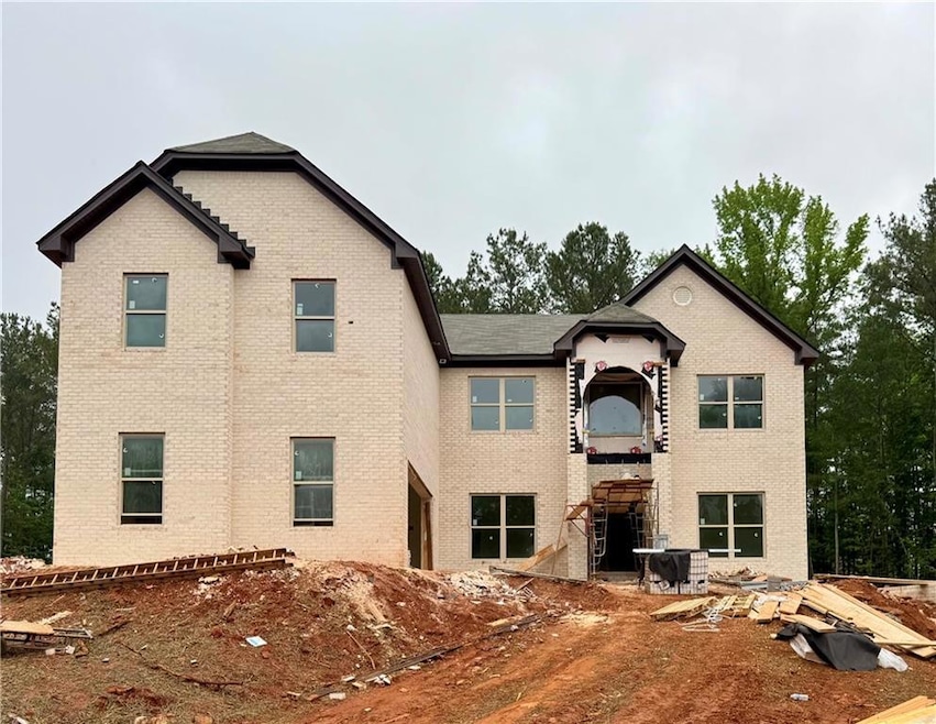 View of front of house with brick siding