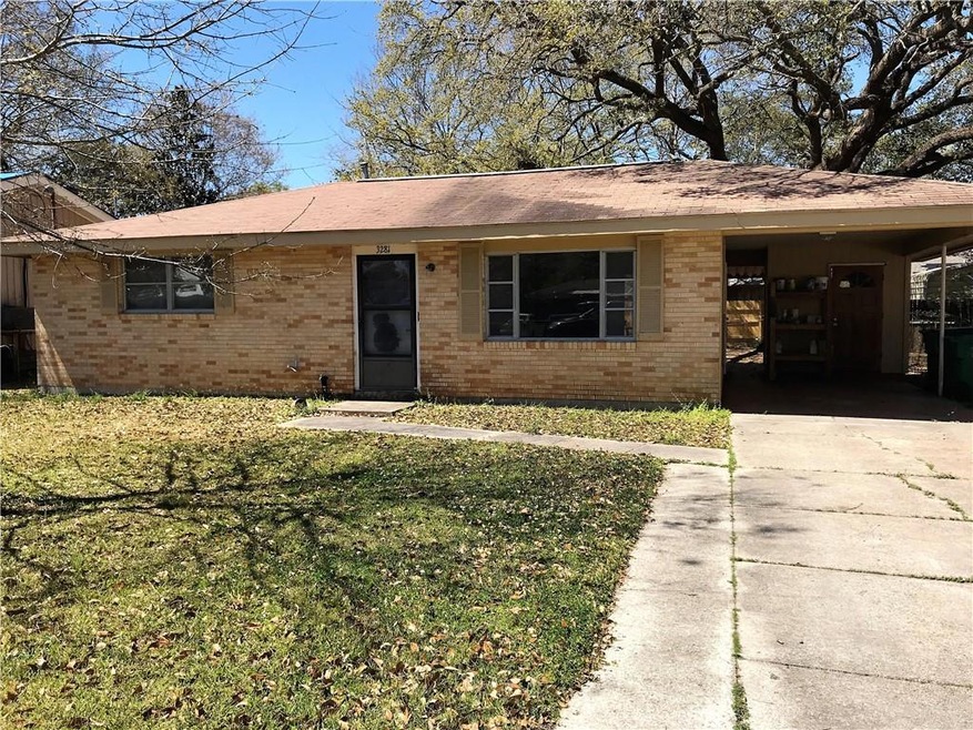 Nice Brick home with covered carport, large fenced