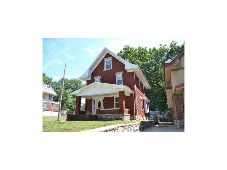 Brick 3-story home.