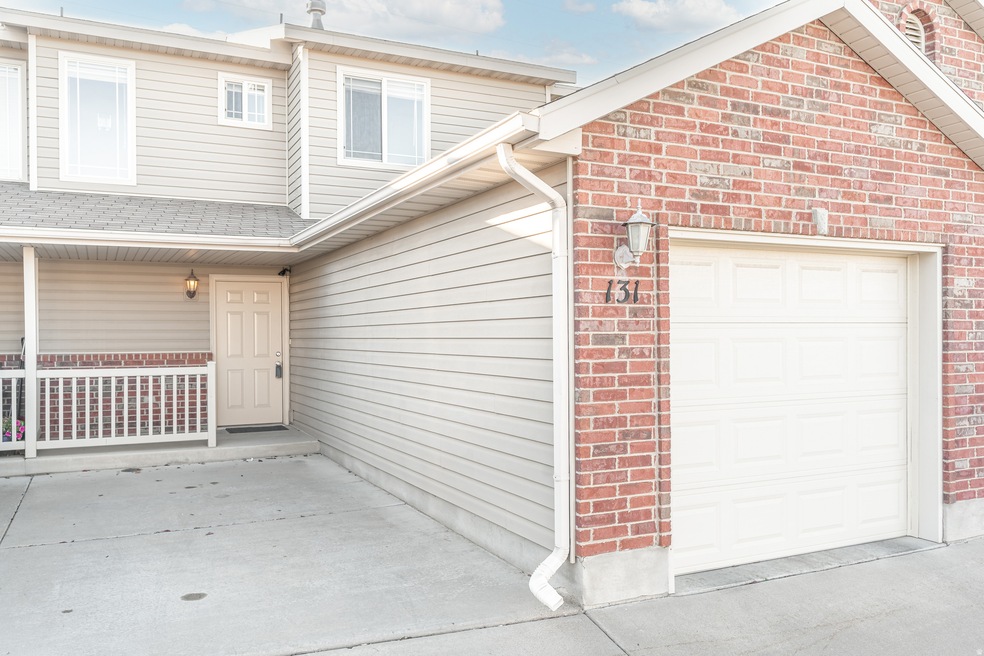 View of front of property with a garage