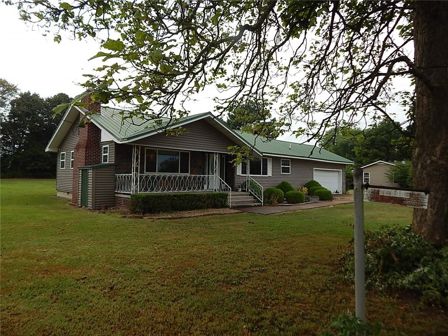 Sitting on an acre with newer siding, roof, window