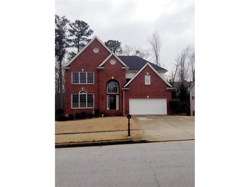 Exterior front of home features brick front, 2 car