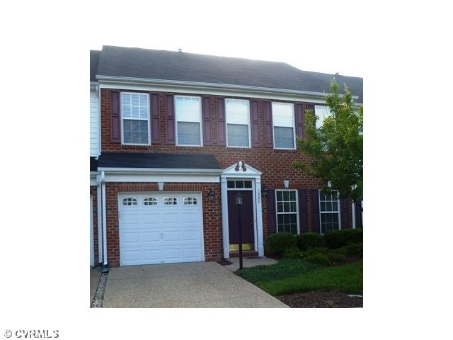 Exterior Front - Handsome townhome in well maintained neighborhood convenient to highways, shopping and restaurants.  The garage makes parking comfortable!