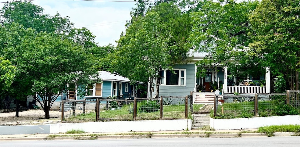 Obstructed view of property featuring a porch, a 