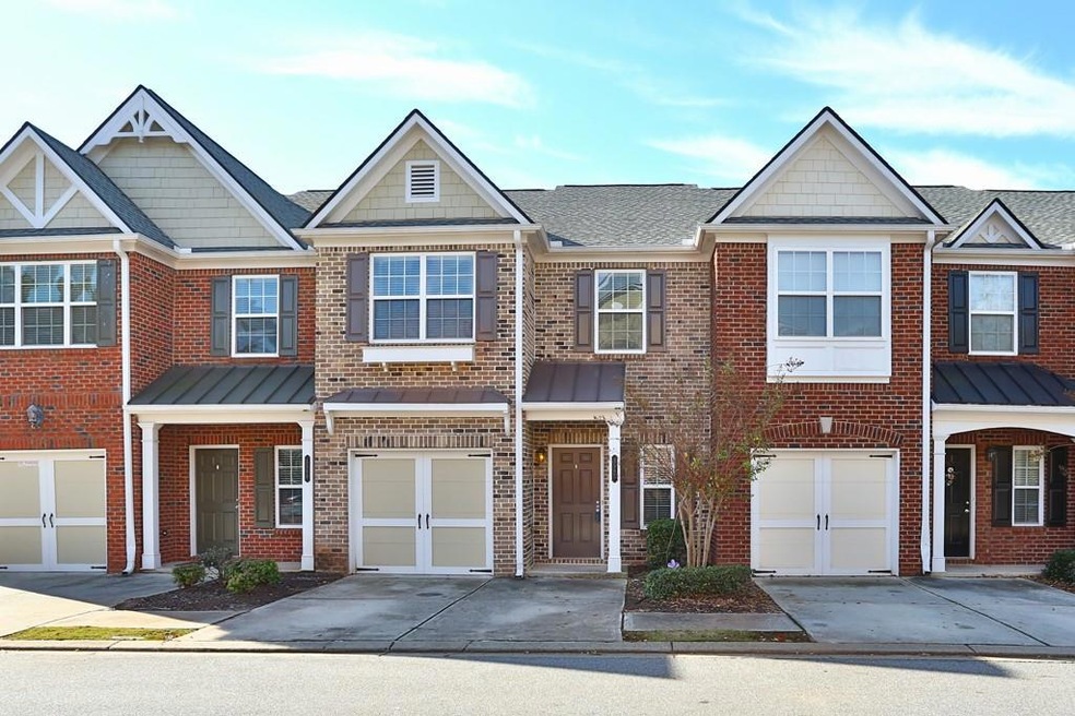 All brick front townhome with new roof...