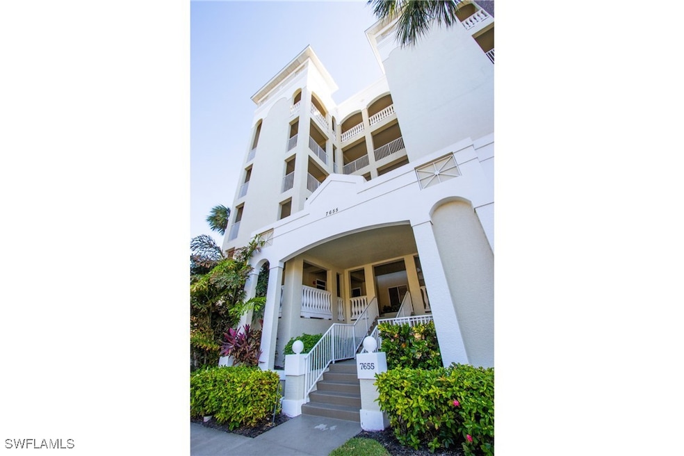 7655 Pebble Creek Cir unit 201, Naples, FL 34108 - photo 1