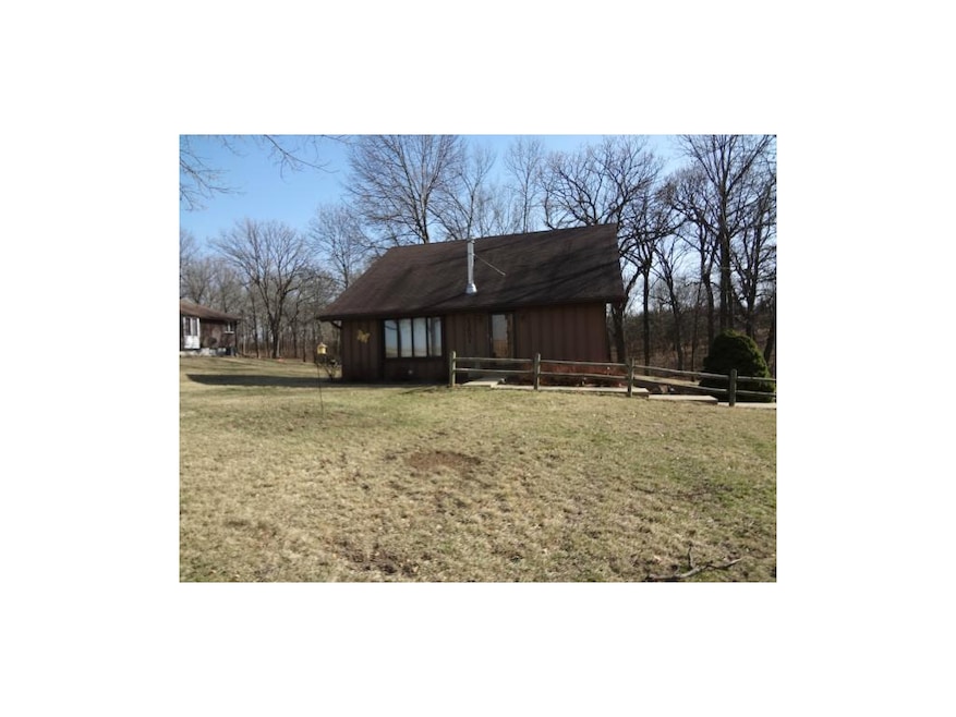 FRONT VIEW OF HOME (HOME FACES NORTH)
