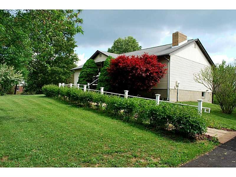 Exterior Front. Nice ranch with mature landscaping