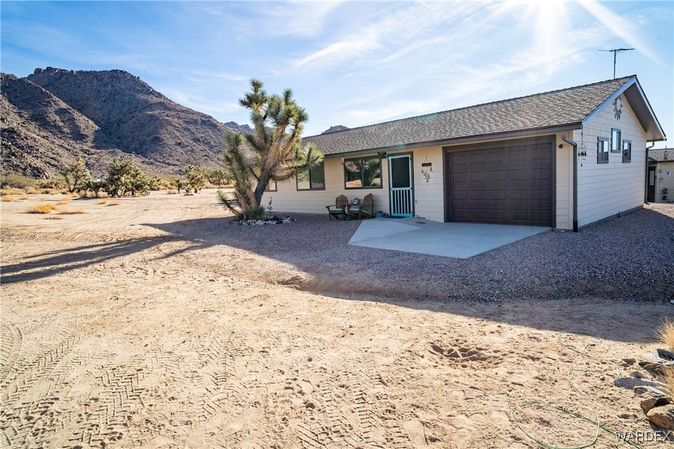 Ranch-style house featuring a mountain view and a