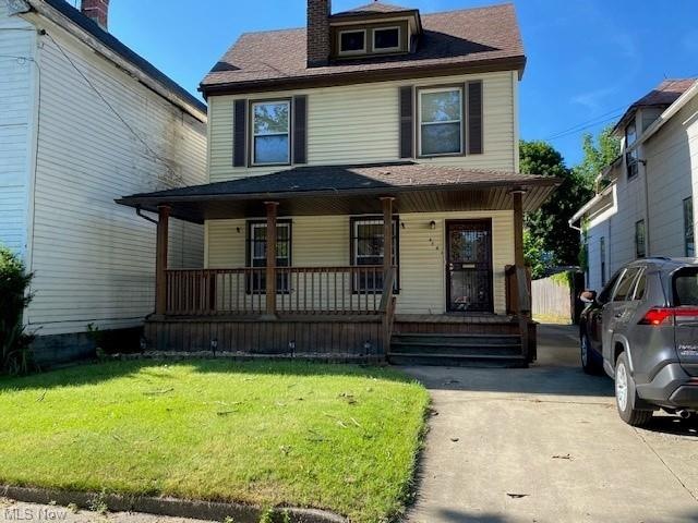 FRONT OF HOUSE WITH PORCH