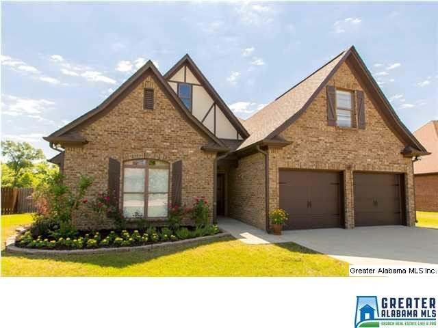Living is easy in this all brick home in a quiet s